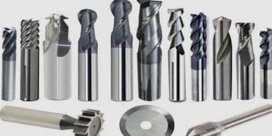 Various metal cutting tools and drills.