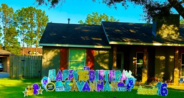 Colorful birthday yard sign celebrating Savannah's 16th birthday.