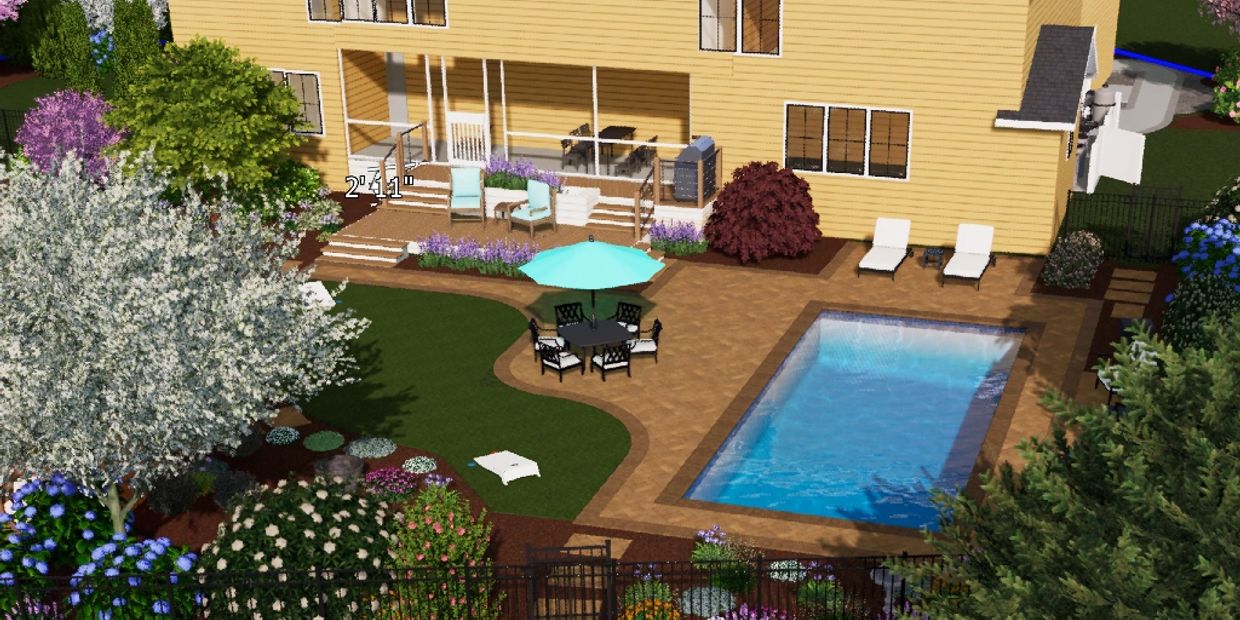 Backyard with swimming pool and garden seating area.