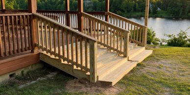 Custom deck construction project overlooking a waterfront property. Circle S Improvements specialize