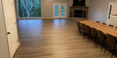 Luxury vinyl plank flooring installation completed as part of a residential renovation project by Ci