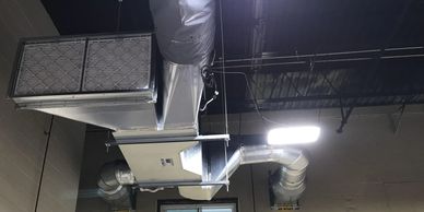 BPE-XE-MIR-3000 Energy Recovery installed in a machine shop.