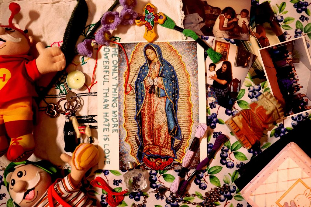 A colorful religious and family-themed collage with toys, photos, and embroidery.