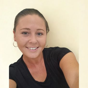 Photo of Rebecca smiling.