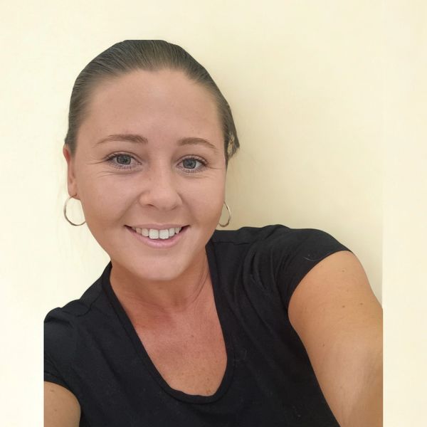 Photo of Rebecca smiling.