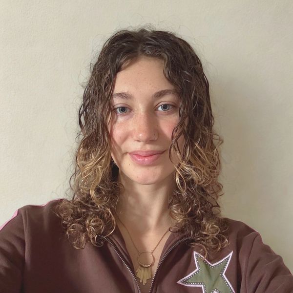 Photo of Olivia smiling.