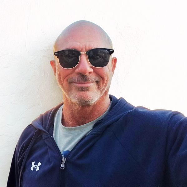 Photo of Rodney smiling.