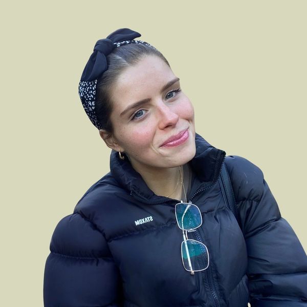 Photo of Tyler-May smiling.