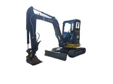 Compact blue and yellow excavator with a bucket.
