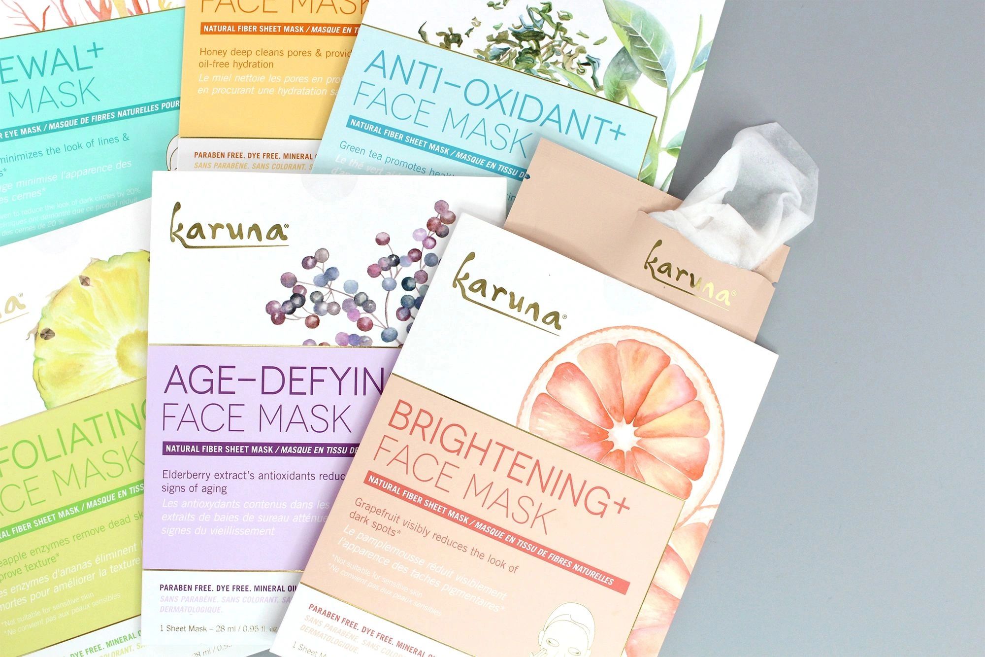Various Karuna natural fiber sheet face masks with vibrant packaging.