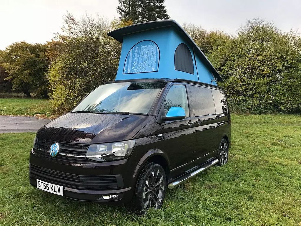 Black Volkswagen Transporter with Skyline elevating roof 