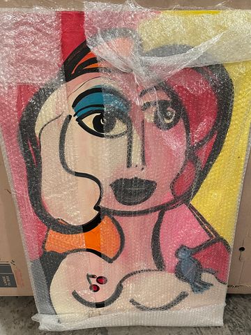Abstract colorful portrait wrapped in bubble wrap.