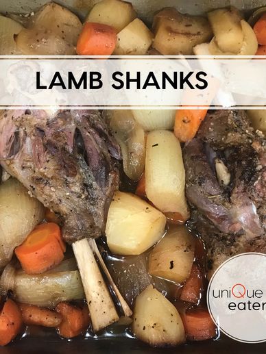 Braised lamb shanks with vegetables in a savory sauce.
