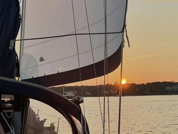 Sailing Vessel Phoenix during a private sunset sail in Vineyard Haven Harbor, Martha's Vineyard