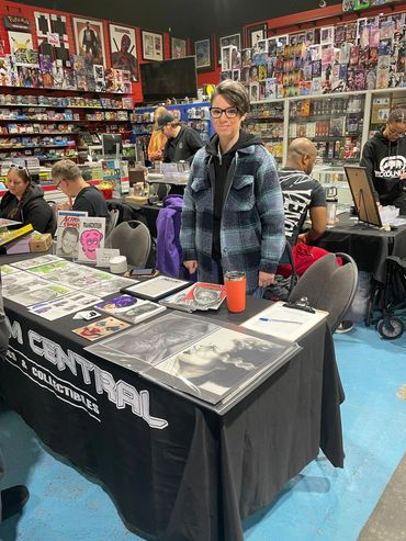 comic artist, portrait artist jessica archer artworks at local comic shop gotham central comics