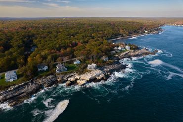 Houses along the rocky shore in midcoast Maine