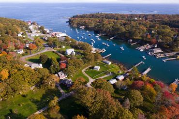 Harbor with boats and working waterfront businesses in midcoast Maine