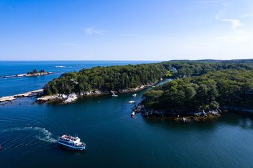A ferry returning from an island in midcoast Maine