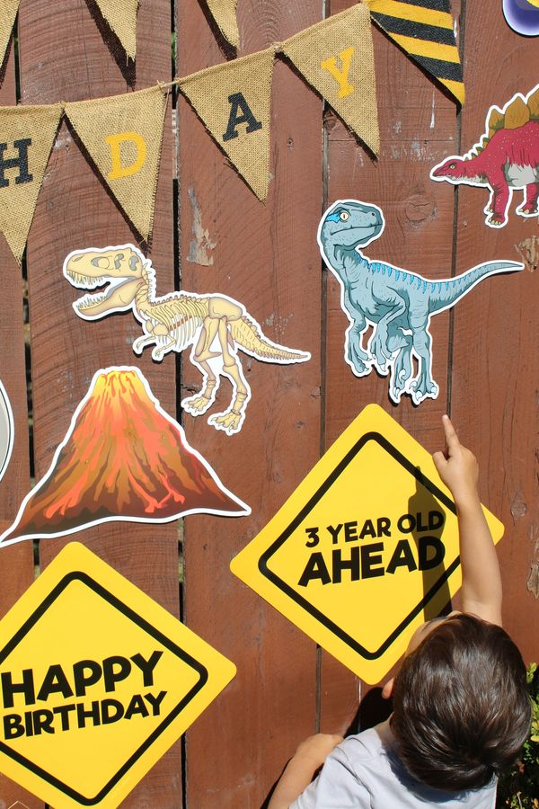Dinosaur cutouts, dino party supplies and decorations