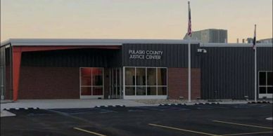Pulaski County Justice Center building exterior at dusk.