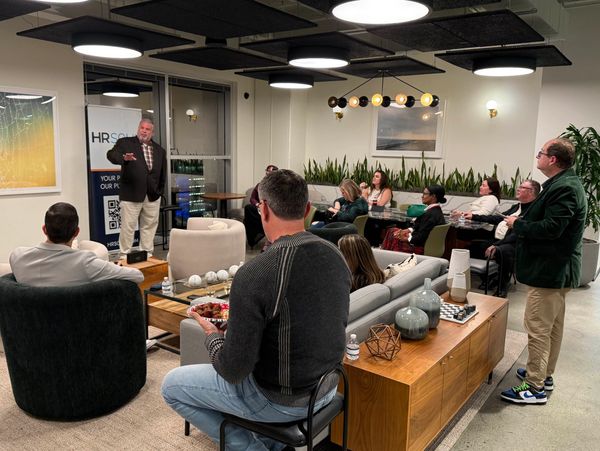 Yogi Mueller delivering a leadership keynote to business leaders