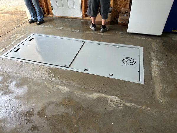 Garage installed storm shelter in a Tennessee home.  