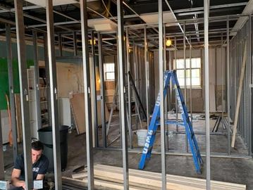 Metal framing installed for interior walls during building construction.