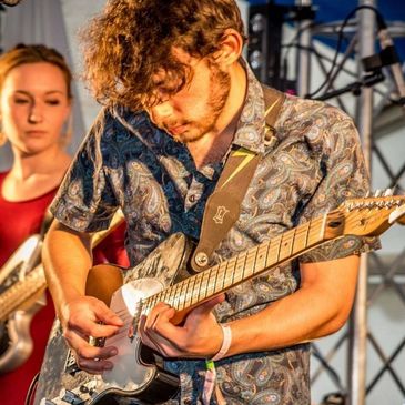 Louis Calisse on guitar.