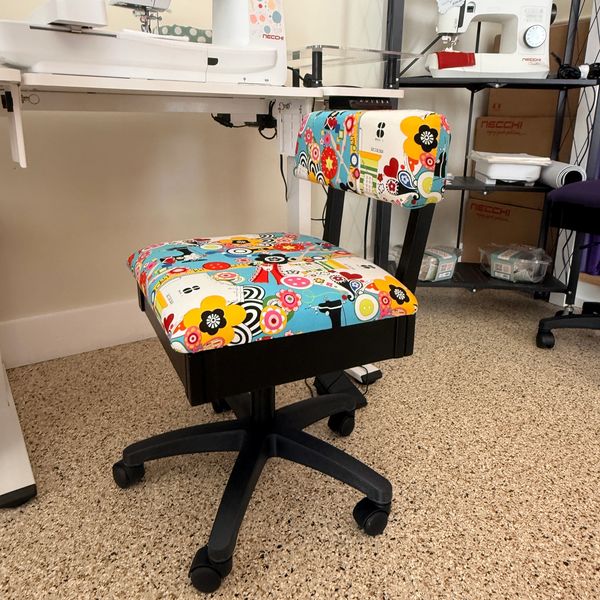 Colorful office chair with a floral pattern.