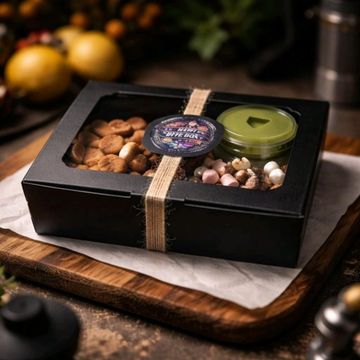 A sharing box of mini cookies, mini brownies and mini chunks of rocky road from the Happy Bite Box