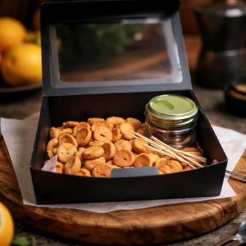 Box of mini cookies and three dipping sauces from Happy Bites Box