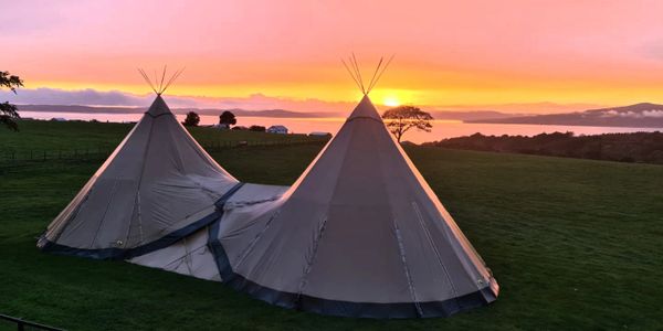 Nightsky Event Tipi set up on farmland overlooking the west coast, River Clyde. Tipi hire weekend