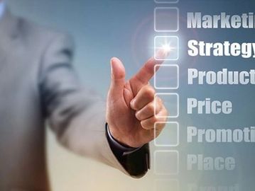 Person selecting strategy in marketing checklist.