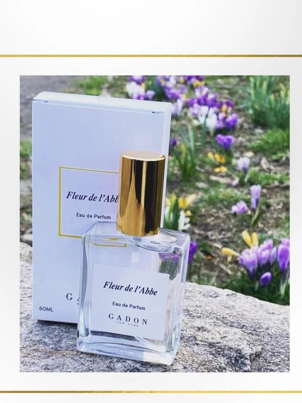 Fleur de l'Abbe Eau de Parfum on a rock