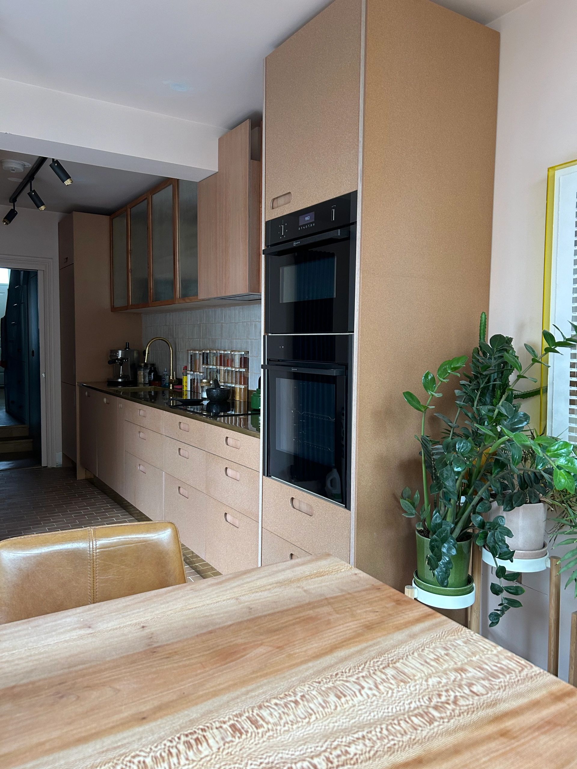 Bespoke plywood kitchen. Bespoke birch plywood doors and drawer fronts with cork and London plane. R