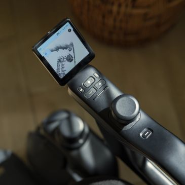 Bike handlebar with digital display and control buttons.