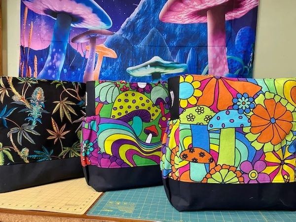 3 bags one with cannabis bud fabric, 2 with hippie trippy mushrooms 70s looking rainbow fabric