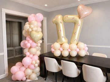 17th birthday balloon decorations in pink and gold.