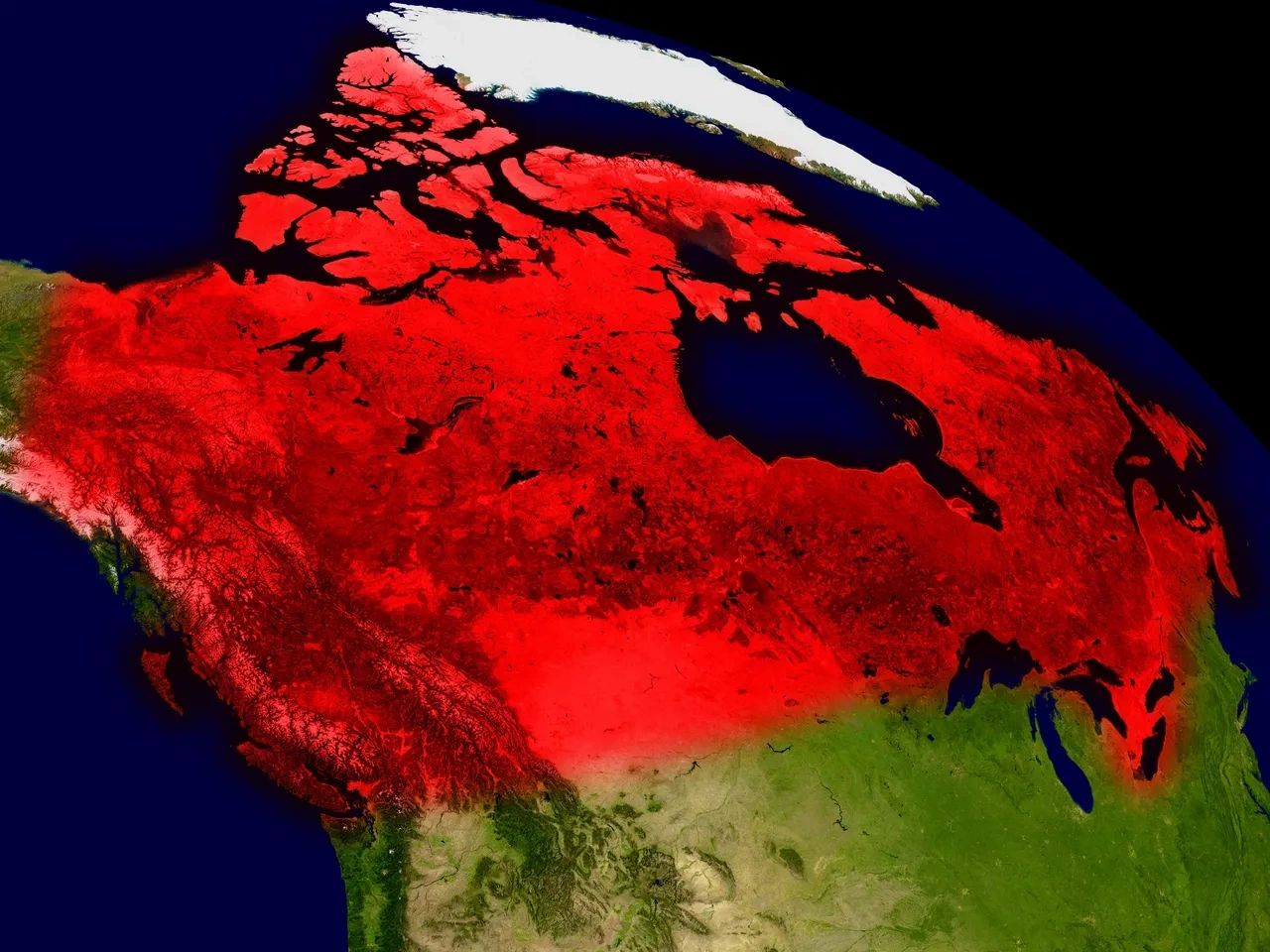 Satellite image showing Canada with a heat map effect highlighting northern areas in red.