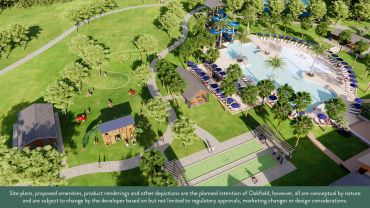 Aerial view of a park with pools, pathways, and green spaces.