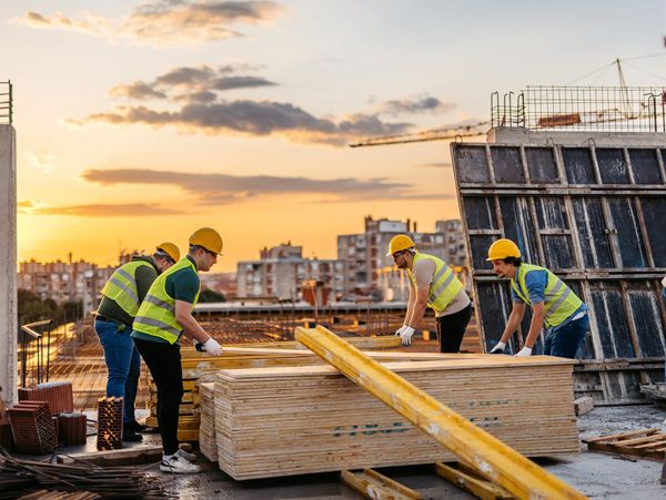 Construction Workers Working On A Construction Site 