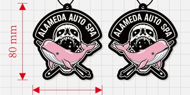 Two Alameda Auto Spa logos featuring a skull and pink whale, with dimensions.