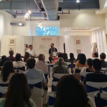 Singer during a live music performance at Shailja Art Gallery in Gurgaon