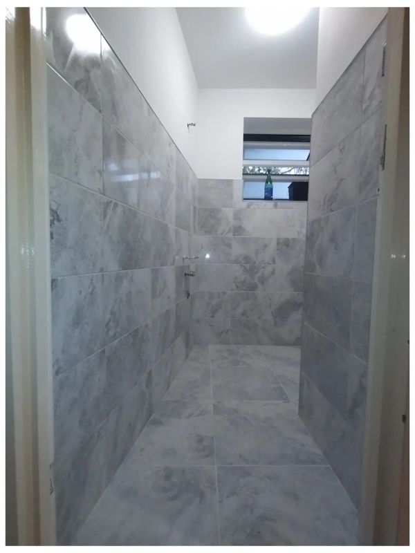 Grey marble ceramic wall tiles. Large format grey marble porcelain floor tiles in Betchworth 
