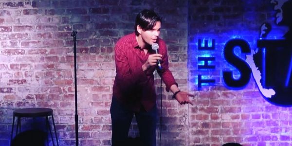 Dick Colligan performing standup comedy in New York City
