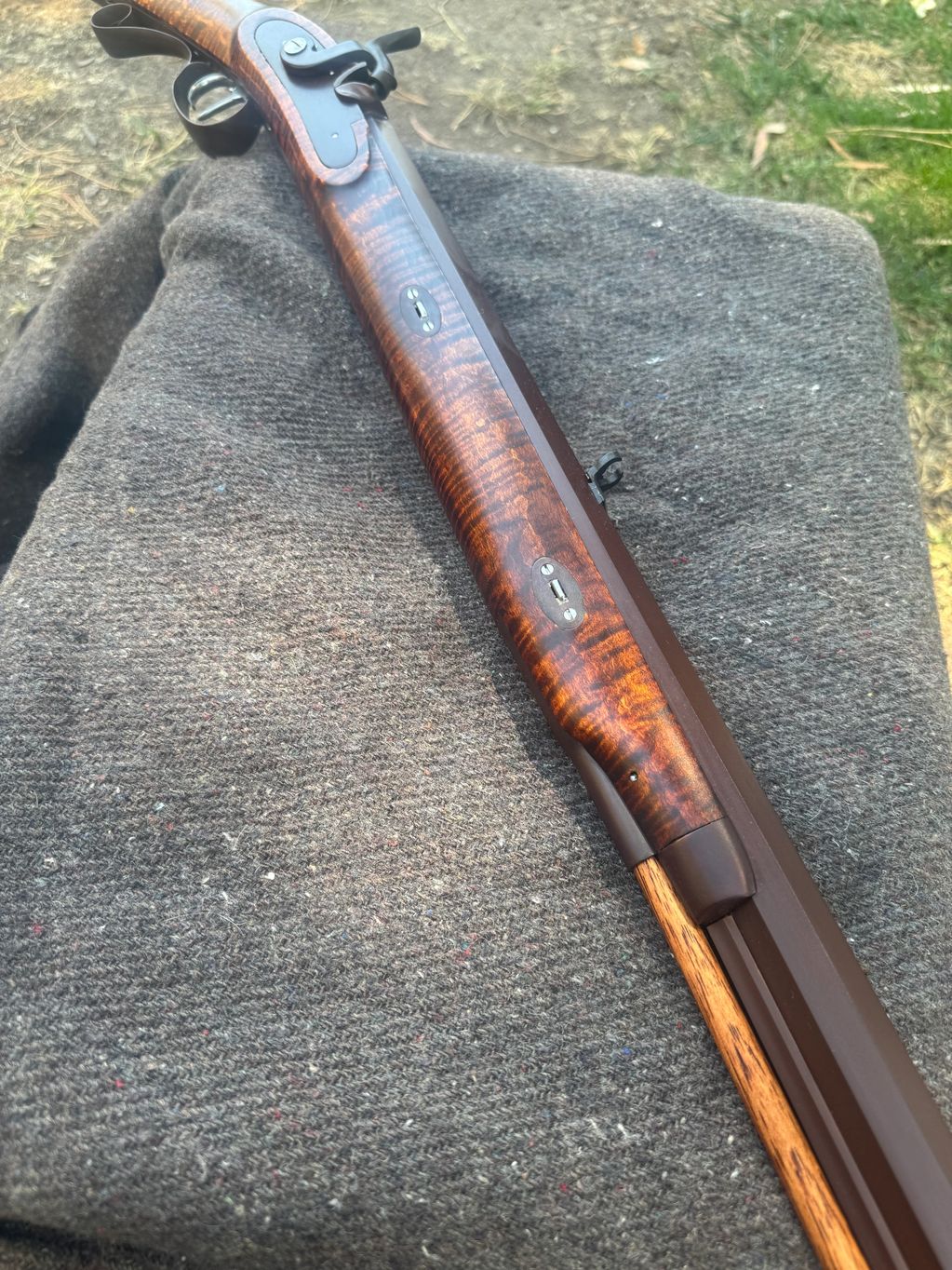 View of browned steel finish, nose cap entrynpipe, barrel wedge keys and escutcheons.