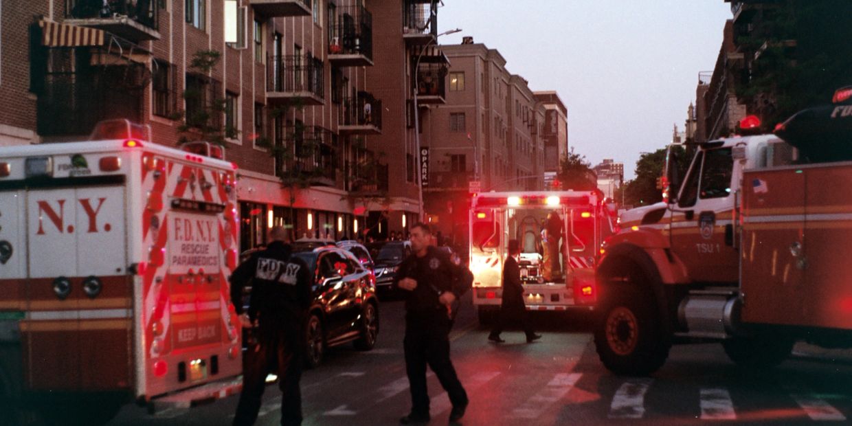 New York City accident site with fire trucks