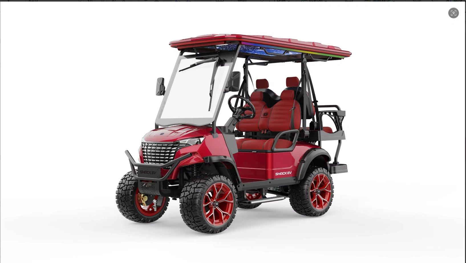 Red electric golf cart with rugged tires and roof.