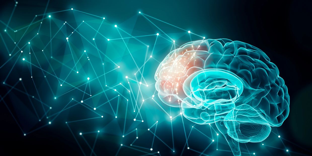 Digital illustration of a glowing human brain with neural network connections.