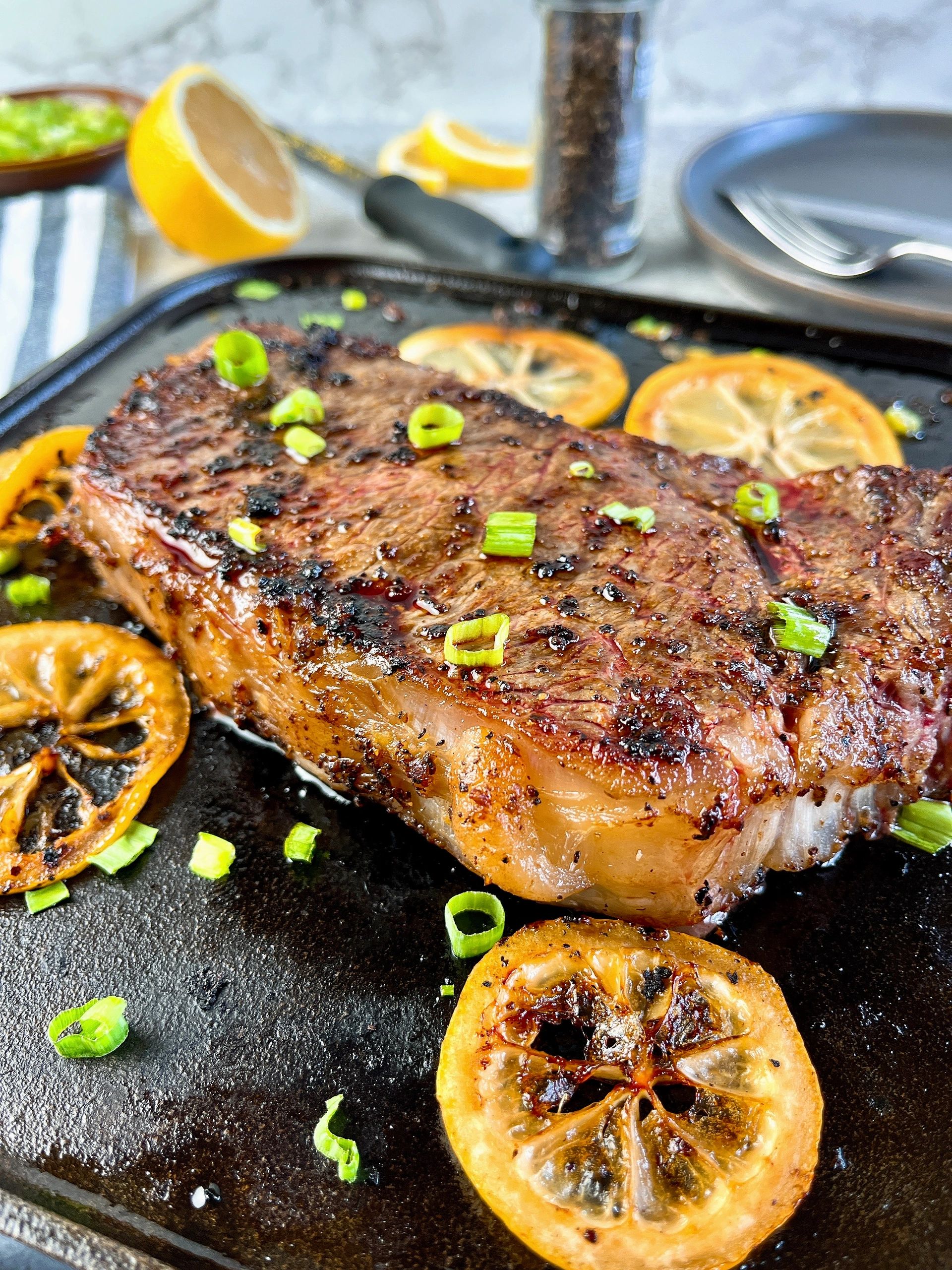 Lemon-Pepper Ribeye Filets with Roasted Tomatoes